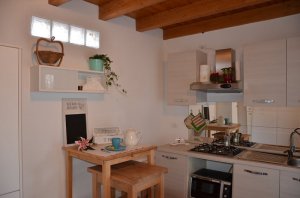 Foto Cucina con spaziosa veranda